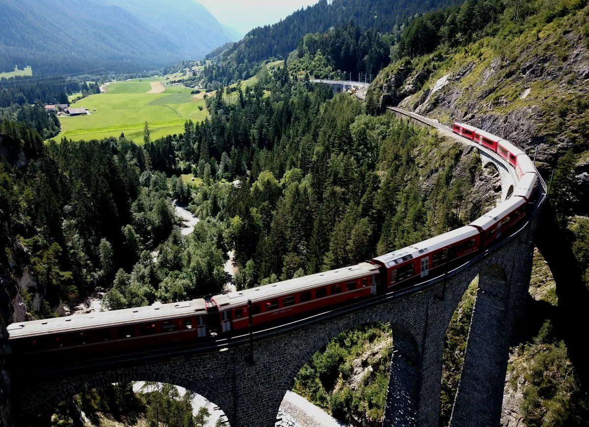 Train crossing the Landwasser Viaduct in the Swiss Alps