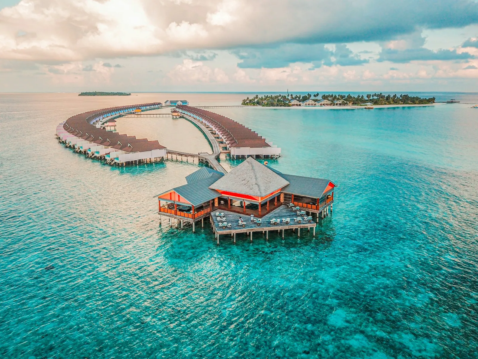 Overwater villas at an island resort in the Maldives